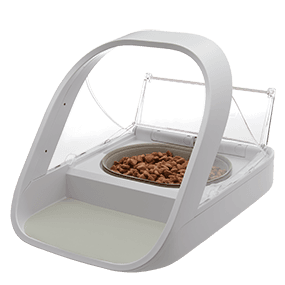 SureFeed feeder with its lid open over a bowl of dry food.